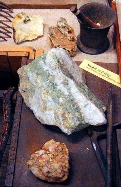 Muller & tray used to grind up rock containing gold at El Dorado County Historical Museum. Placerville, CA.
