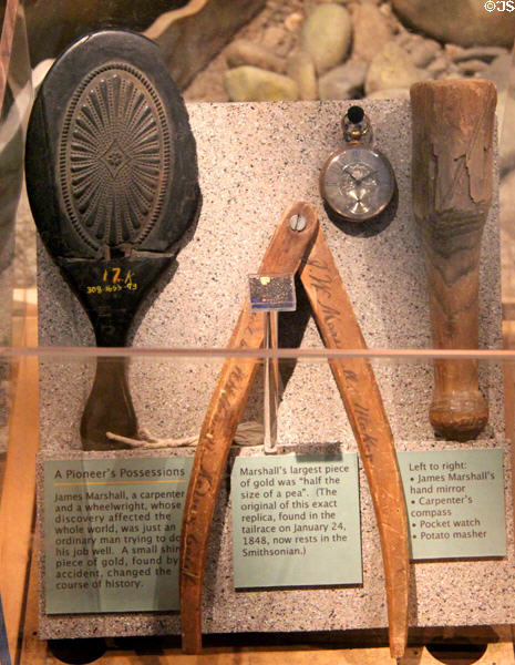 Hand mirror, carpenter's compass, pocket watch & potato masher which belonged to James Marshall in museum at Marshall Gold Discovery SHP. Coloma, CA.