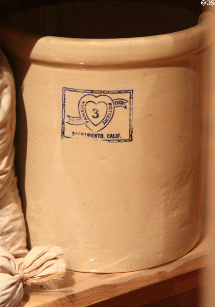 Pottery crock labeled Sacramento CA in museum at Marshall Gold Discovery SHP. Coloma, CA.