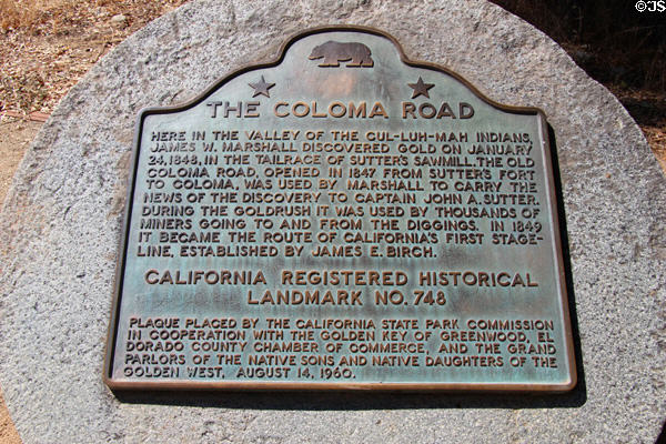 Plaque marking the old Coloma Road used by James Marshall in 1848 to carry news of gold discovery & later used by thousands of miners going to diggings; road became California's first stage-line in 1849 at Marshall Gold Discovery SHP. Coloma, CA.