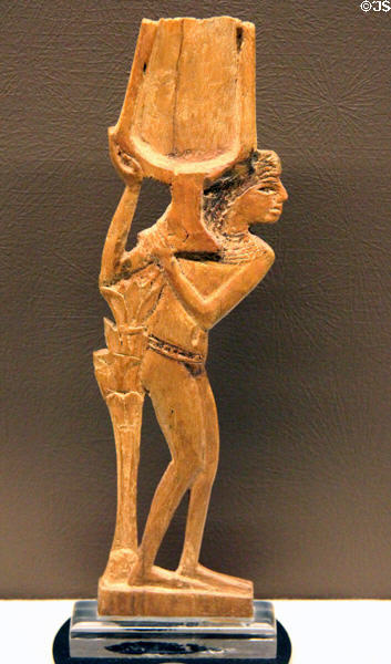 Cosmetic spoon carved as nude in wood (Dynasty 18 - c1543-1292 BCE) at Rosicrucian Egyptian Museum. San Jose, CA.
