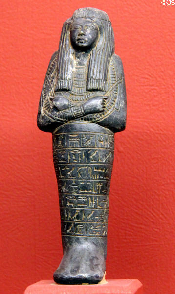 Steatite stone Ushabti to perform tasks in afterlife (Dynasty 19 - c1292-1189 BCE) at Rosicrucian Egyptian Museum. San Jose, CA.