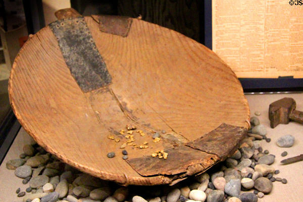 Wooden batea used to pan for gold by Mexican gold miners at Oakland Museum of California. Oakland, CA.