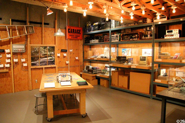 Early computers displayed in garage such as ones where computer pioneers got their start at Oakland Museum of California. Oakland, CA.