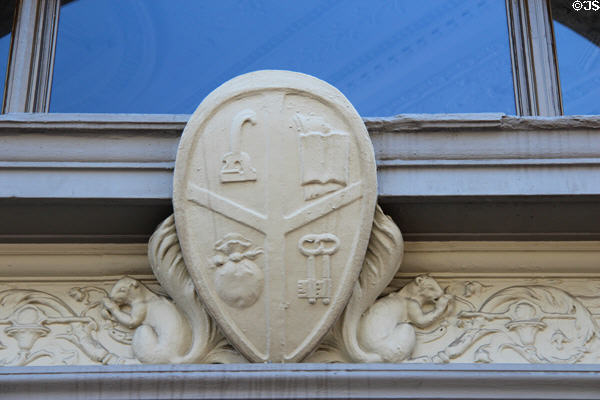 Coat of arms with squirrels plaque on Westlake Building (350 Frank H. Ogawa Plaza). Oakland, CA.