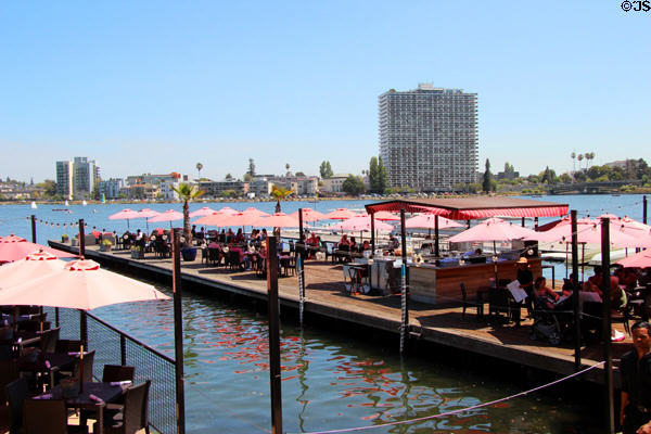Lake Chalet docks with restaurant tables. Oakland, CA.