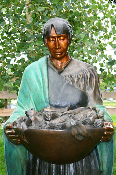 Beauty of the Harvest sculpture (2005) showing Pueblo woman with corn by Martha Pettigrew at Leanin' Tree Museum. Boulder, CO.