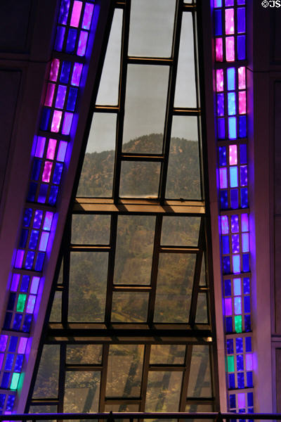 Stained glass & view of mountains from Protestant chapel of USAF Academy Chapel. Colorado Springs, CO.