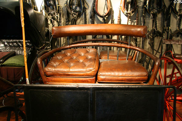 Surrey with elevated driver's seat to give more leverage over horses at El Pomar Carriage Museum. Colorado Springs, CO.