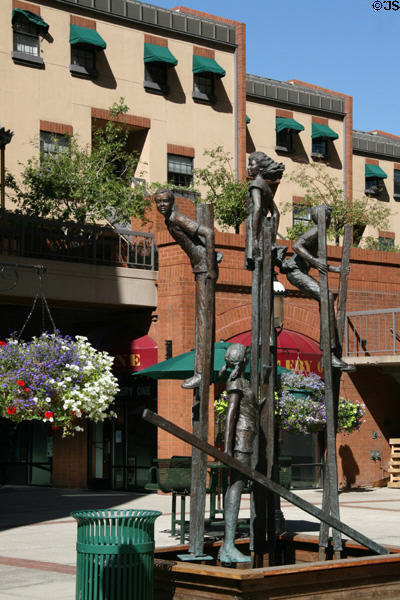 Statues of children at play in Writer Square. Denver, CO.