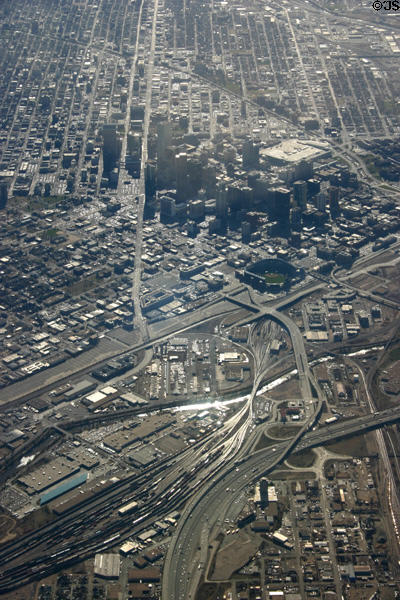 Downtown Denver from the air with rail yards in foreground. Denver, CO.