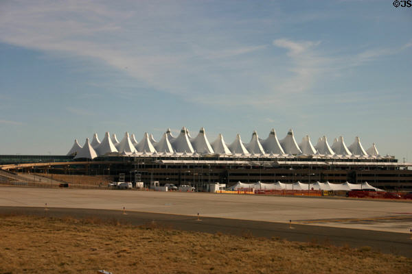 Elrey Jeppesen Terminal (1995) with Teflon-coated fiberglass roof at Denver International Airport. Denver, CO. Architect: C.W. Fentress, J.H. Bradburn & Assoc..