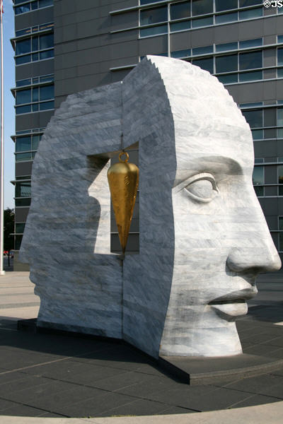East 2 West Source Point sculpture (2003) by Larry Kirkland view with open head & gold plumb at Webb Municipal Office Building. Denver, CO.
