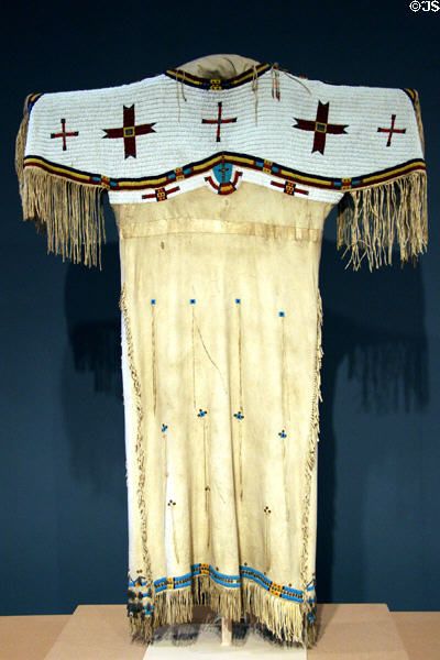 Lakota Sioux deerskin dress with beadwork & feather decoration (c1880) at Denver Art Museum. Denver, CO.