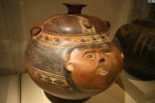 Chincha or Ica vessel with human head (c1100-1470 CE) from South Coast of Peru at Denver Art Museum. Denver, CO.