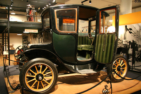 Side view with open door of 100-mile Fritchle Electrics automobile (c1913) at Colorado History Museum. Denver, CO.