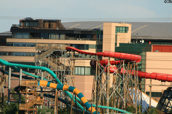 Water slide of Six Flags Elitch Gardens against Pepsi Center. Denver, CO.