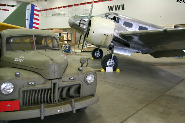 Beech UC-45 Expeditor (1940) behind WWII staff car at Wings Over the Rockies Museum. Denver, CO.