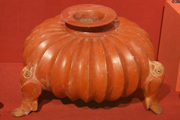 Ceramic pumpkin tomb vessel with parrot shaped feet (200-300 CE) from Nayarit or Jalisco Western Mexico at Museo de las Americas. Denver, CO.