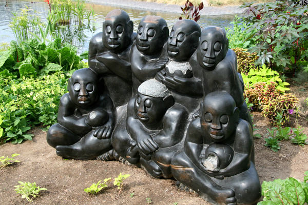 The Bira (elders gathering to pay respect to ancestral spirits) stone sculpture (1995) by Square Chickwanda of Zimbabwe at Denver Botanic Gardens. Denver, CO.