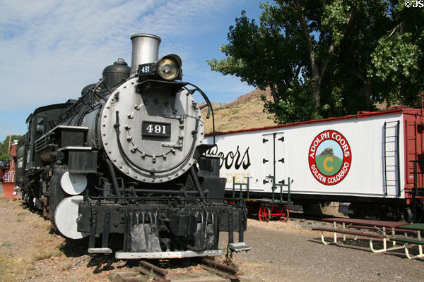 Denver & Rio Grande 2-8-2 steam locomotive #491 (1902) built by Baldwin sits beside Adolph Coors refrigerator car at Colorado Railroad Museum. CO.