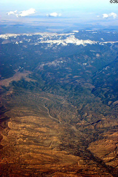 Rocky Mountains & foothills from air approached from west. CO.