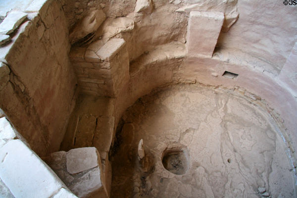 Kiva detail where small hole beside fire pit is symbolic entry to underworld at Spruce Tree House in Mesa Verde National Park. CO.
