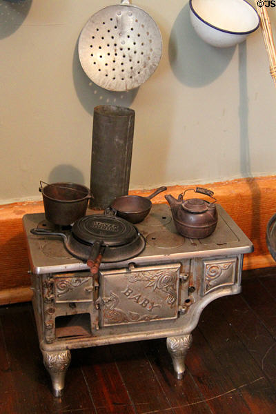 Baby cast iron toy stove from St. Clair at McAllister House Museum. Colorado Springs, CO.