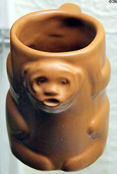 Ceramic cup with face by Van Briggle Pottery at Colorado Springs Pioneers Museum. Colorado Springs, CO.
