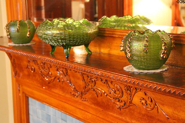 Fireplace with green glass bowls at Rosemount House Museum. Pueblo, CO.