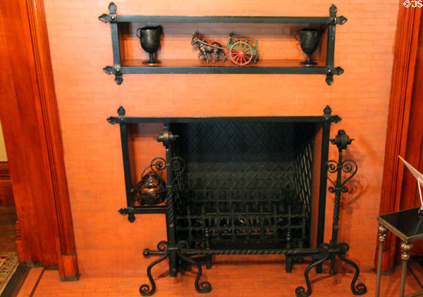 Fireplace with display shelves at Rosemount House Museum. Pueblo, CO.