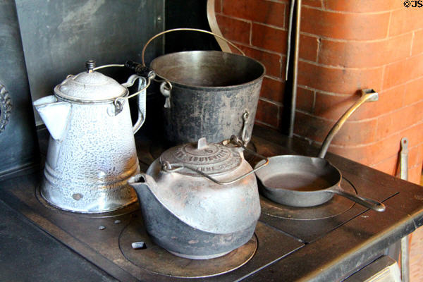 Kettles & pans on cast iron range at Rosemount House Museum. Pueblo, CO.