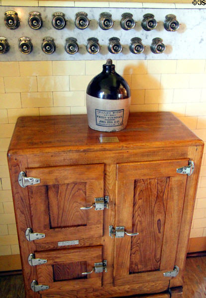 House intercom system over ice box by Blackmer's Milling & Mfg. Co. plus stoneware jug at Rosemount House Museum. Pueblo, CO.