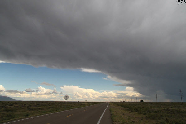 Storm clouds over southeastern Colorado road. CO.