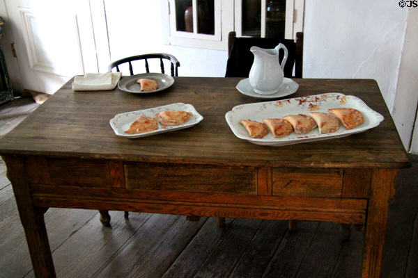 Kitchen table with platters at Baca Adobe House. Trinidad, CO.