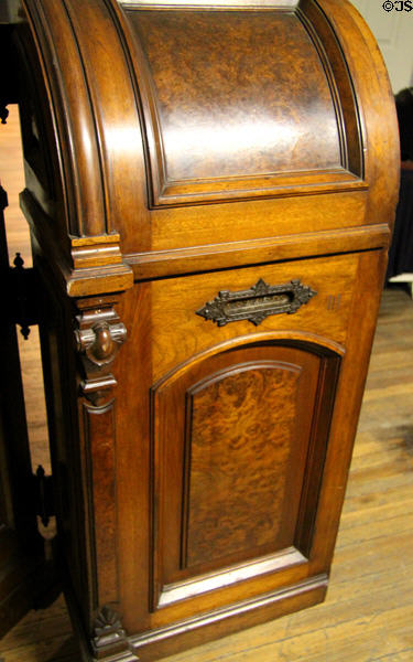 Mail slot on Wooten Patent Desk (1874-97) at A.R. Mitchell Museum of Western Art. Trinidad, CO.