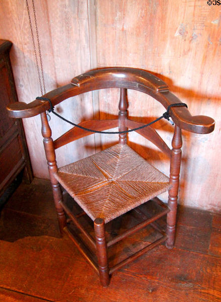 Corner chair (aka roundabout desk chair) (18th C) at Henry Whitfield State Museum. Guilford, CT.