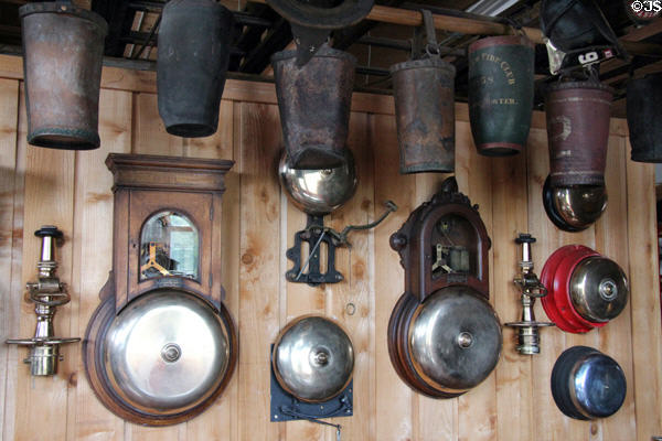 Leather fire buckets & signal bells at Museum of Fire History. Bristol, CT.