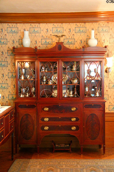 Break-front cabinet with collection of English & American silver (c1900) at Hill-Stead Museum. Farmington, CT.