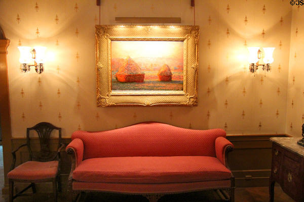 Grainstacks, in Bright Sunlight (1890) by Claude Monet over Chippendale-style sofa (c1900) from England at Hill-Stead Museum. Farmington, CT.
