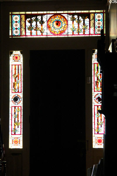 Stained glass windows surrounding front door of Isham-Terry House Museum. Hartford, CT.