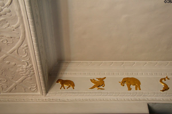 Frieze of gold animals in raised plaster at Connecticut Historical Society. Hartford, CT.