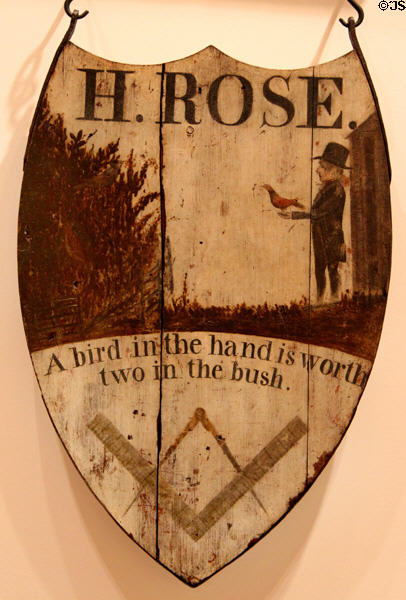 H. Rose 'Bird in the hand is worth two in the bush.' sign with Masonic symbols at Connecticut Historical Society. Hartford, CT.