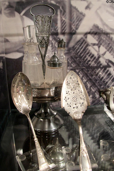 Caster set (c1895) by Barbour Bros. Co. of Hartford plus silver fish spoon (c1900) from Meriden & cake server (1847) from Hartford at Connecticut Historical Society. Hartford, CT.