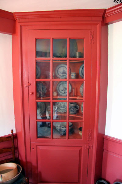 Corner cupboard with china at Noah Webster House. West Hartford, CT.