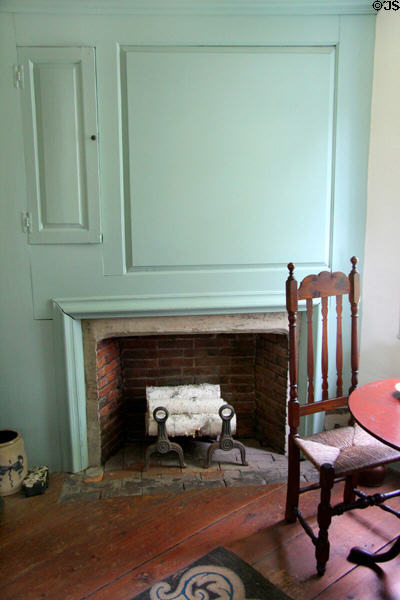Fireplace with large wooden panel above mantle at Oliver Ellsworth Homestead Museum. Windsor, CT.