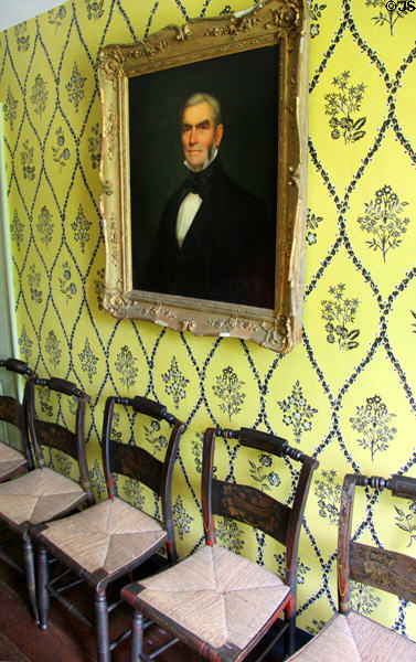 Stenciled chairs original to house & family portraits line upstairs hall at Oliver Ellsworth Homestead Museum. Windsor, CT.