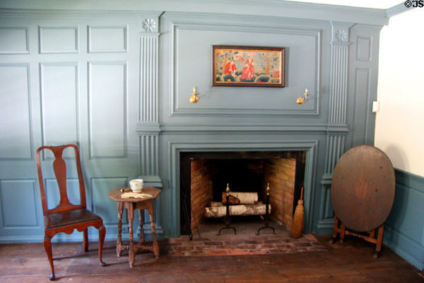 Parlor fireplace with tilt table & chair at Phelps-Hathaway House. Suffield, CT.