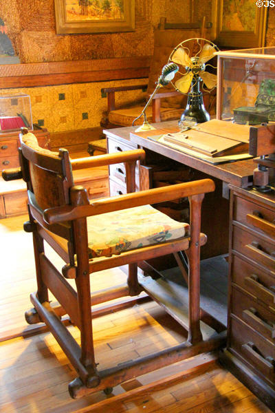 Gillette's desk with rollout chair on tracks at Gillette Castle State Park. East Haddam, CT.