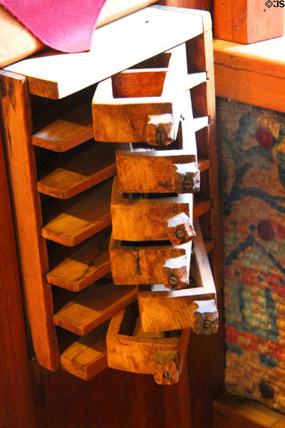 Swing out storage drawers in William Gillette's bedroom at Gillette Castle State Park. East Haddam, CT.